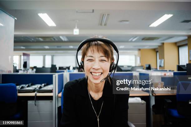 business woman having a video chat - コールセンター　日本 ストックフォトと画像