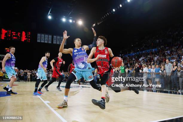 LaMelo Ball of the Hawks drives against RJ Hampton of the Breakers during the round 9 NBL match between the New Zealand Breakers and the Illawarra...