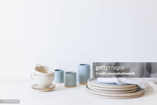 plates, dishes, bowls and vase arrangement - stack of plates stock pictures, royalty-free photos & images