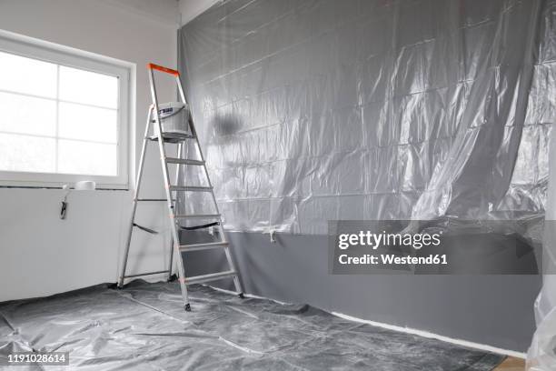 renovation of a room - protective sheet stock pictures, royalty-free photos & images