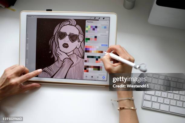 female web designer using tablet at home - graphics tablet stock pictures, royalty-free photos & images