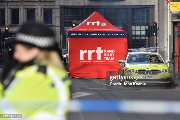 Rapid Relief Team station is set up at the scene of yesterday's London Bridge stabbing attack on November 30, 2019 in London, England. A man and a...