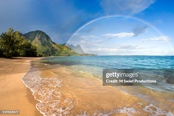 rainbow kauai - hawaii beach stock pictures, royalty-free photos & images