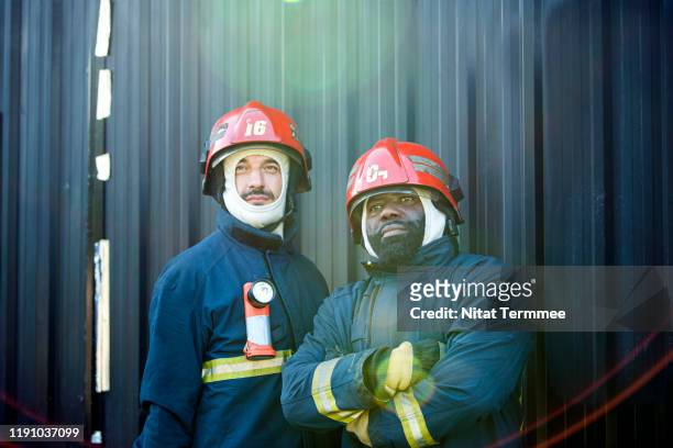 Portrait of smiling firefighter rescue in protective uniform. Emergency safety and Protection rescue from danger.