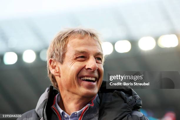 Jurgen Klinsmann, Manager of Hertha BSC looks on prior to the Bundesliga match between Hertha BSC and Borussia Dortmund at Olympiastadion on November...