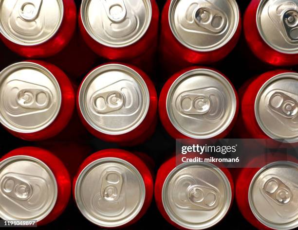 the top of an aluminum drink cans - coca cola stock pictures, royalty-free photos & images