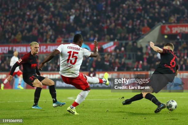 Jhon Cordoba of 1. FC Koeln scores his team's first goal during the Bundesliga match between 1. FC Koeln and FC Augsburg at RheinEnergieStadion on...