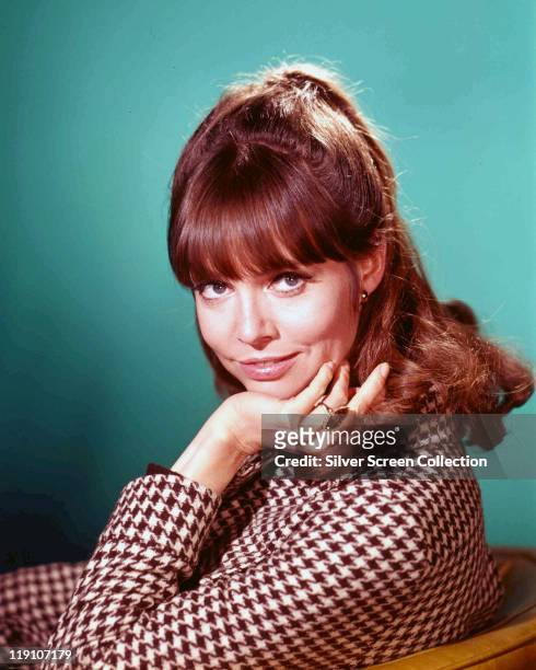 Barbara Feldon, US actress, poses with her chin resting in on her hand in a publicity portrait for the US television series, 'Get Smart', USA, circa...