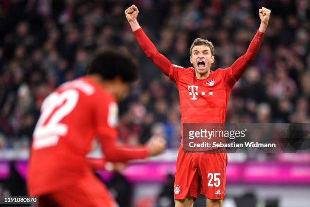 Thomas Muller of FC Bayern Munich celebrates after scoring his team's first goal during the Bundesliga match between FC Bayern Muenchen and Bayer 04...