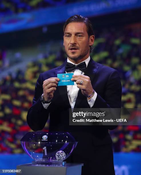 Francesco Totti, former Italian footballer draws out England in to Group D during the UEFA Euro 2020 Final Draw Ceremony at Romexpo on November 30,...