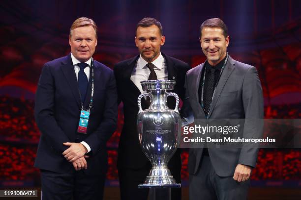 Ronald Koeman, Head coach of the Netherlands, Andriy Shevchenko, Head Coach of Ukraine, and Franco Foda, Head Coach of Austria pose for a photo with...