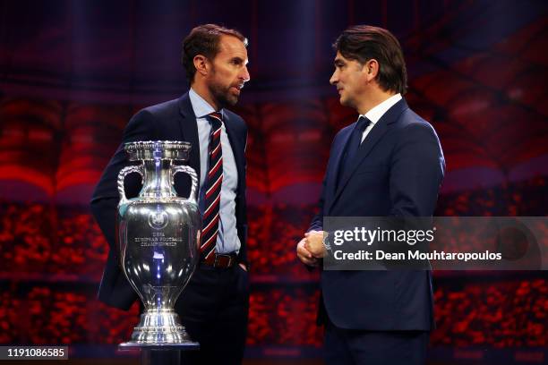 Gareth Southgate, Head Coach of England speaks with Zlatko Dalic, Head Coach of Croatia after the UEFA Euro 2020 Final Draw Ceremony at the Romexpo...