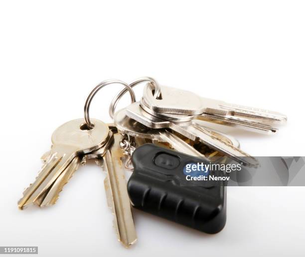 close-up of keys on white background - car isolated doors open stock pictures, royalty-free photos & images