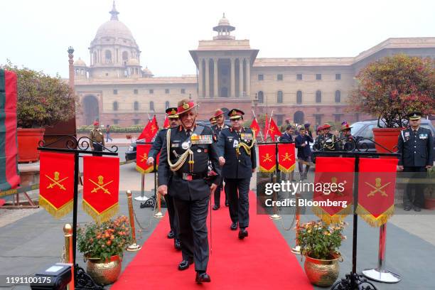 General Bipin Rawat, India's chief of defence staff, center, arrives at the South Block of the Central Secretariat building in New Delhi, India, on...