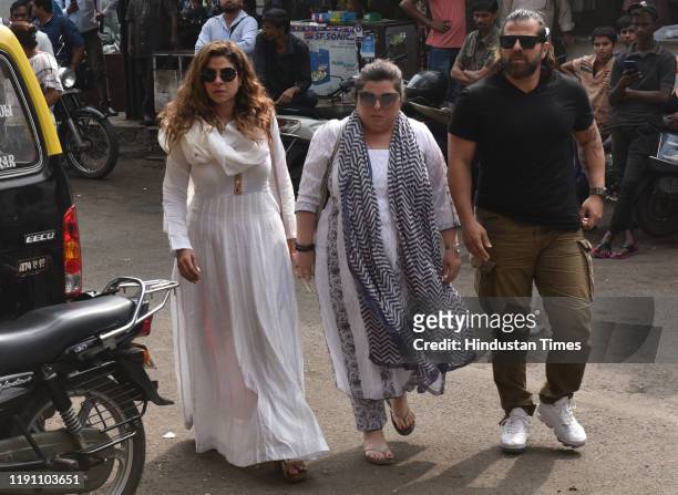 Television actors Tanaaz Irani with her husband Bakhtiyaar Irani and his sister, Delnaaz Irani during the funeral of Television actor Kushal Punjabi...