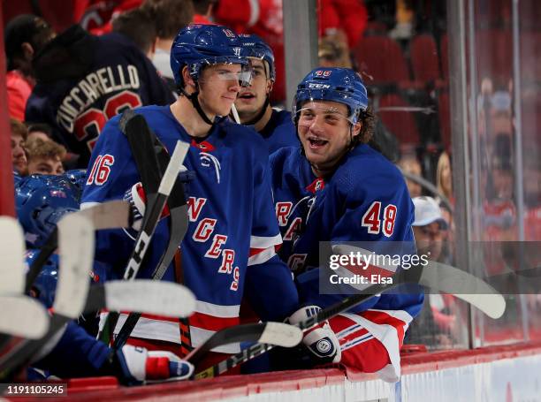 Ryan Strome and Brendan Lemieux of the New York Rangers smile from the bench in the final minutes of the game against the New Jersey Devils at...