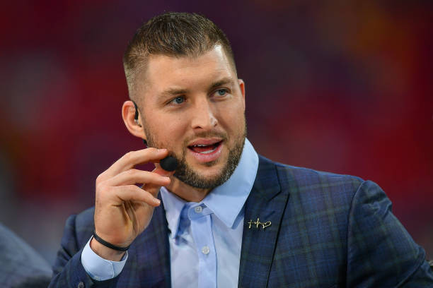 Football analyst and Heisman Trophy winner Tim Tebow during the College Football Playoff Semifinal game between the LSU Tigers and the Oklahoma...