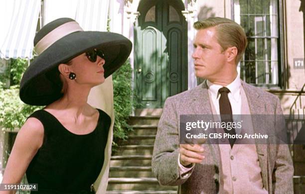 The movie "Breakfast at Tiffany's", directed by Blake Edwards and based on the novel by Truman Capote. Seen here from left, Audrey Hepburn as Holly...