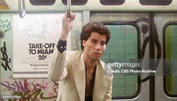 Actor John Travolta on a New York City subway during the fiming of 'Saturday Night Fever' . Initial theatrical wide release December 16, 1977. Screen...