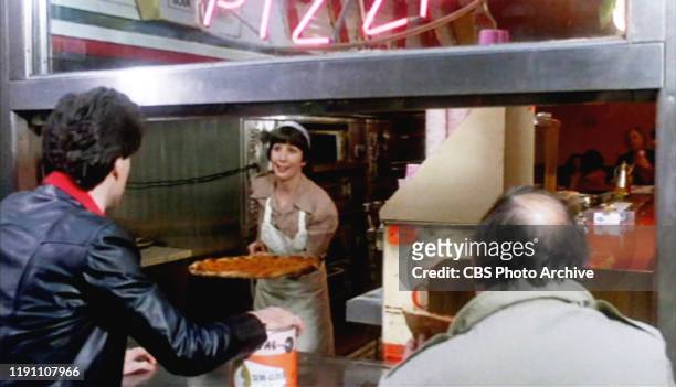 The movie "Saturday Night Fever", directed by John Badham. Seen here from left, John Travolta as Tony Manero facing Ann Travolta as Pizza Girl....