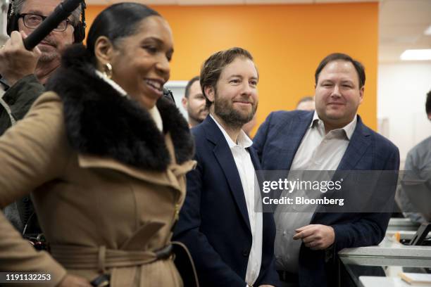 Charlie Bachtell, chief executive officer of Cresco Labs LLC, center, Joe Caltabiano, president of Cresco Labs, right and Juliana Stratton,...