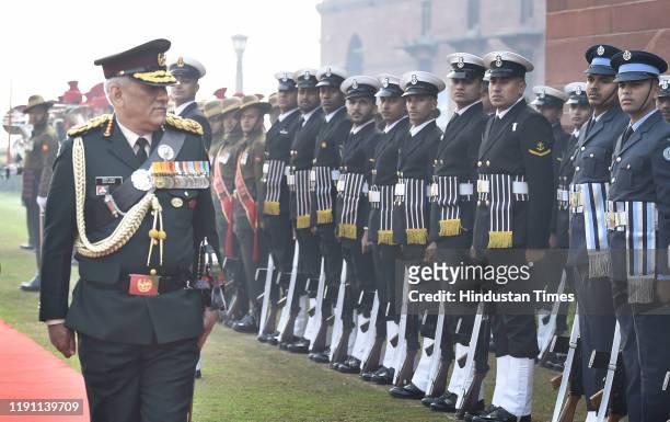India's first Chief of Defence Staff Gen Bipin Rawat inspects the Guard of Honour, at South Block lawns, on January 1, 2020 in New Delhi, India....
