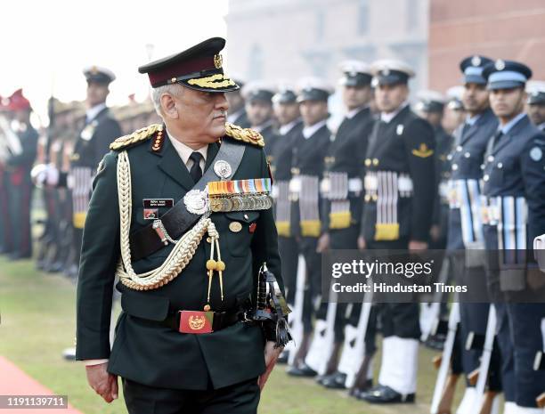 India's first Chief of Defence Staff Gen Bipin Rawat inspects the Guard of Honour, at South Block lawns, on January 1, 2020 in New Delhi, India....