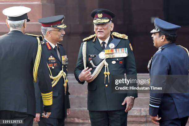 India's first Chief of Defence Staff Gen Bipin Rawat poses for a group photograph with Army Chief General Manoj Mukund Naravane Navy Chief Admiral...