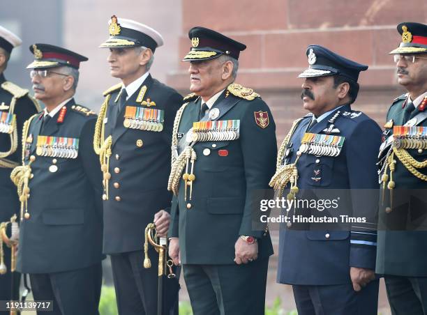 India's first Chief of Defence Staff Gen Bipin Rawat poses for a group photograph with Army Chief General Manoj Mukund Naravane , Navy Chief Admiral...