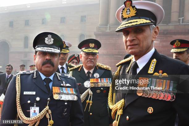 India's first Chief of Defence Staff Gen Bipin Rawat with Navy Chief Admiral Karambir Singh and Air Chief Marshal Rakesh Kumar Singh Bhadauria after...