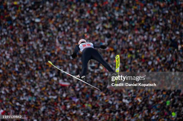 Karl Geiger of Germany competes during the first round of the 68th FIS Nordic World Cup Four Hills Tournament at Olympiaschanze on January 1, 2020 in...