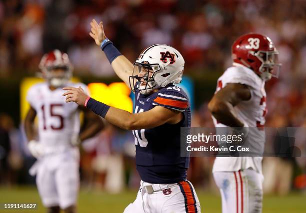 Bo Nix of the Auburn Tigers reacts after drawing the Alabama Crimson Tide offside on 4th and 4 to seal their 48-45 win at Jordan Hare Stadium on...