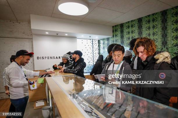 Customers shop for a recreational marijuana at Dispensary 33 store on January 1, 2020 in Chicago, Illinois. - On the first day of 2020, recreational...
