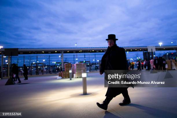 Orthodox Jews attend the 13th Siyum HaShas, a celebration marking the completion of the Daf Yomi, at the MetLife Stadium on January 1, 2020 in East...