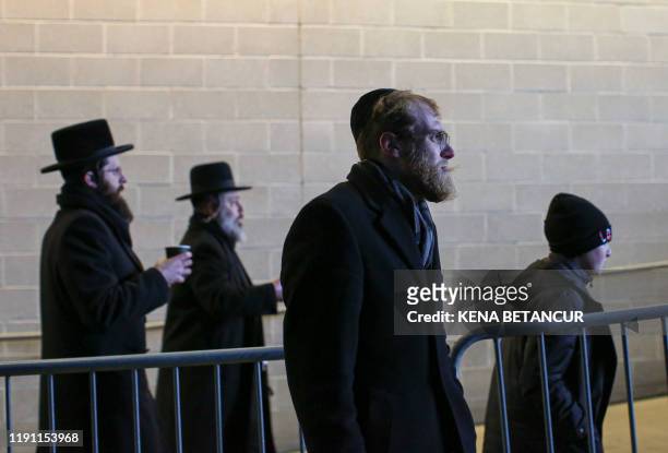 People gather in MetLife Stadium on January 1 in East Rutherford, New Jersey, to mark the Siyum HaShas, an event that celebrates the completion of...
