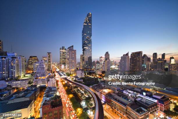 aerial view of bangkok modern office buildings, condominium, living place in bangkok city downtown with sunset scenery, thailand - bangkok night stock pictures, royalty-free photos & images