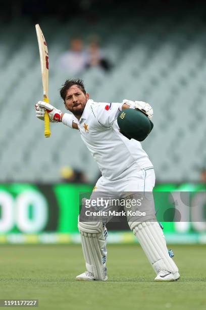 Yasir Shah of Pakistan celebrates his century during day three of the 2nd Domain Test between Australia and Pakistan at the Adelaide Oval on December...