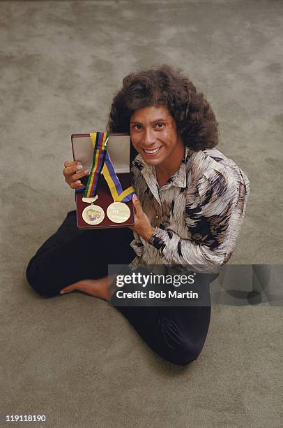 Fatima Whitbread of Great Britain poses with her 1987 World Athletics Champoinship and 1986 European Athletics Championship javelin gold medals...