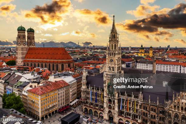 town hall at marienplatz square in munich at sunset. germany. - munich marienplatz stock pictures, royalty-free photos & images