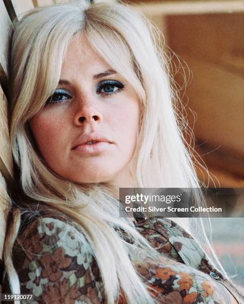 Headshot of Britt Ekland, Swedish actress, with long blonde hair, circa 1970.