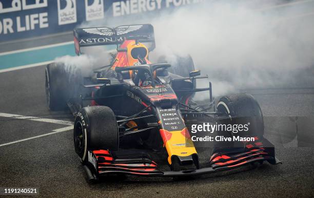 Second placed Max Verstappen of Netherlands and Red Bull Racing celebrates with donuts on track during the F1 Grand Prix of Abu Dhabi at Yas Marina...
