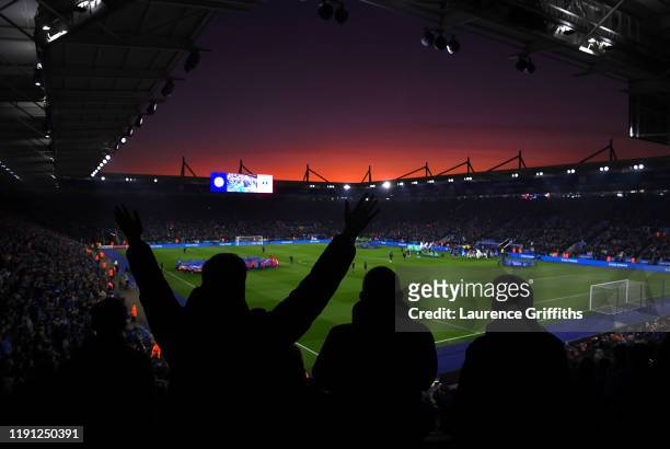 General view as fans show their support as the sun sets during the Premier League match between Leicester City and Everton FC at The King Power...