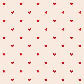 Seamless pattern with red hearts. Romantic creamy peach background for textile, wallpaper, fabric, design. Vector illustration.
