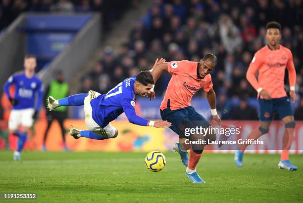 Ayoze Perez of Leicester City is tackled by Djibril Sidibe of Everton during the Premier League match between Leicester City and Everton FC at The...