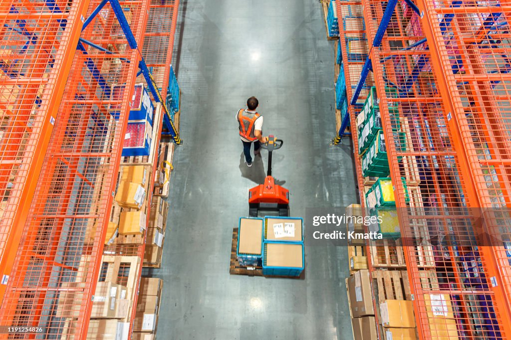 High angle view of Male warehouse worker.