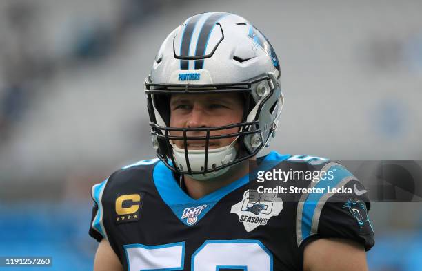 Luke Kuechly of the Carolina Panthers warms up before their game against the Washington Redskins at Bank of America Stadium on December 01, 2019 in...