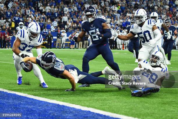 Adam Humphries of the Tennessee Titans dives for a touchdown during the first quarter against the Indianapolis Colts at Lucas Oil Stadium on December...