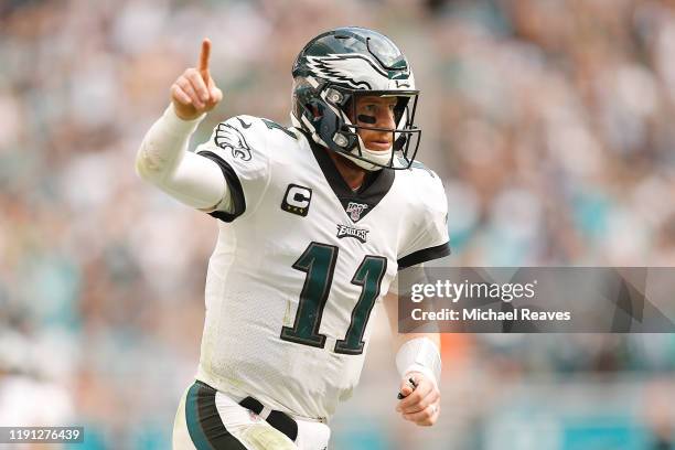 Carson Wentz of the Philadelphia Eagles celebrates after throwing a touchdown to J.J. Arcega-Whiteside against the Miami Dolphins during the second...