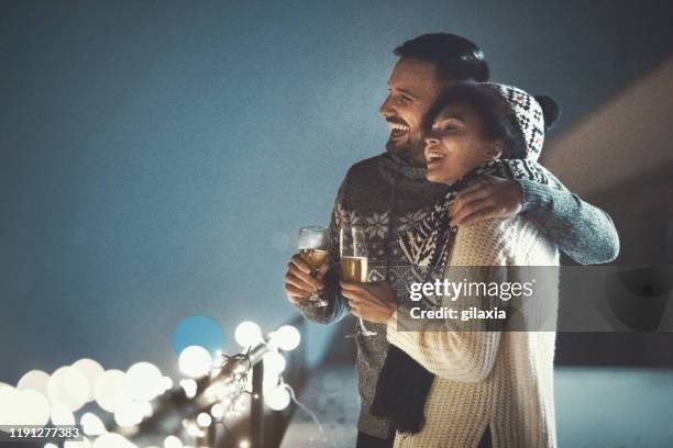 christmas romance. - champagne rooftop stock pictures, royalty-free photos & images