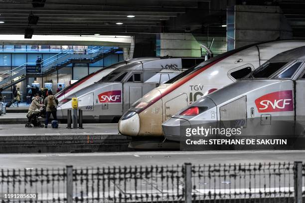 Trains of French national railway operator SNCF are seen at Gare Montparnasse train station in Paris on January 2, 2020 on the 29th day of a...
